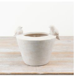 a charming round planter with 3 d birds 