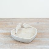 a stylish heart shaped bird bath feeder