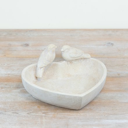 Add a charming touch to your garden with this elegant Cement Heart Bird Bath