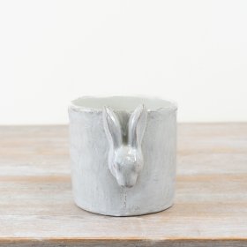Enhance your spring décor with this elegant White Cement Glazed Planter for a fresh, charming look.