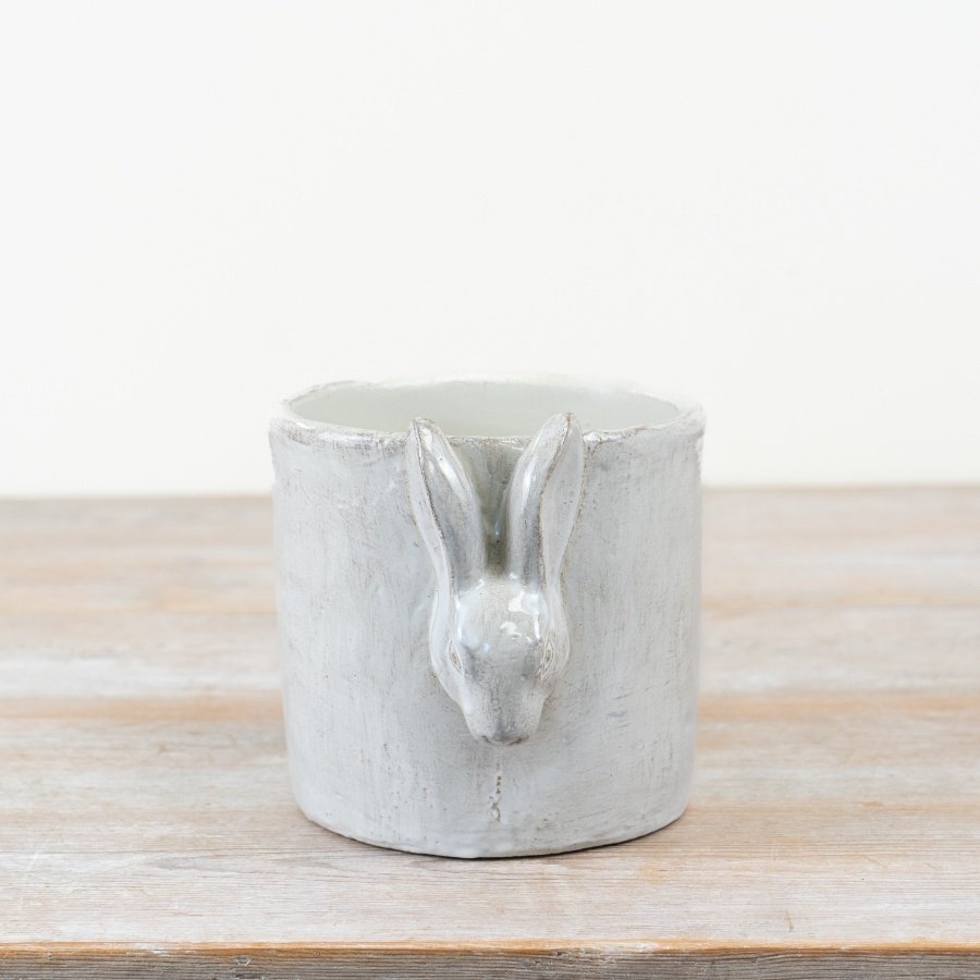 Enhance your spring décor with this elegant White Cement Glazed Planter for a fresh, charming look.