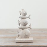 Add coastal charm to your space with this Tall Fish Ornament