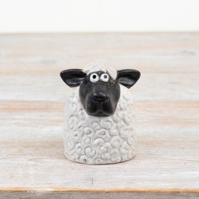 Bring cozy charm to your space with this cute 14cm Sheep Ornament.