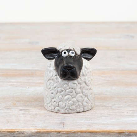 Bring cozy charm to any room with this cute 14cm sheep ornament.