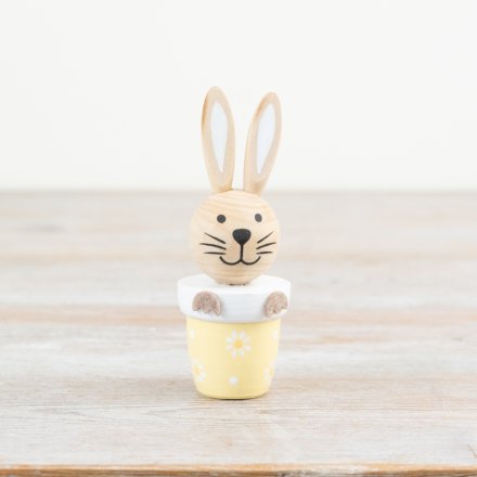 Bring spring vibes indoors with this adorable White Rabbit planter decoration.