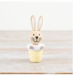 Bring spring vibes indoors with this adorable White Rabbit planter decoration.