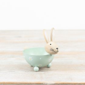 A unique and charming bunny bowl with hand painted daisies and ball feet to display.