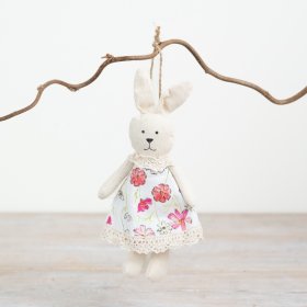 Adorable plush bunny ornament perfect for hanging and decorating any space.