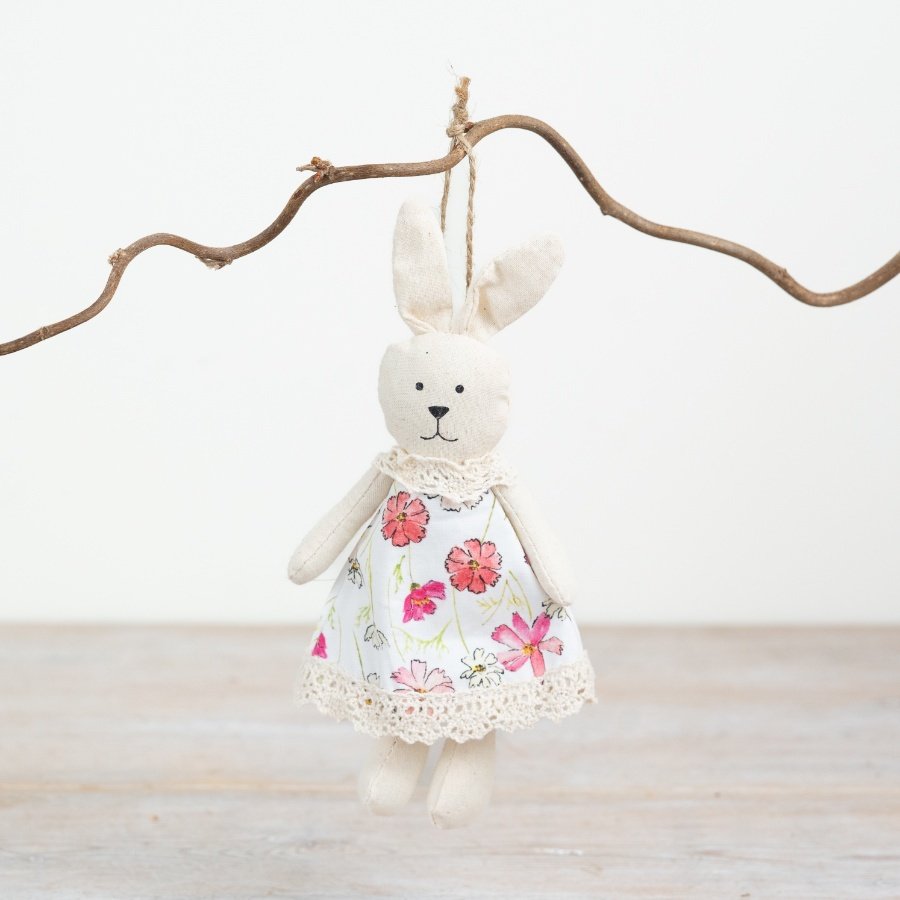Adorable plush bunny ornament perfect for hanging and decorating any space.