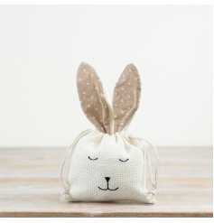 Hide your chocolate goodies in this cute bunny bag with a convenient drawstring closure.