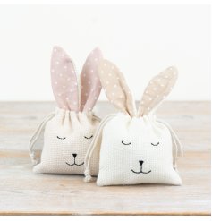 A mix of 2 string gift bags in adorable bunny designs.