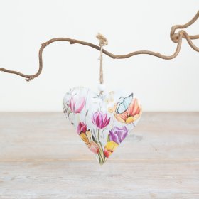 Vibrant floral heart ornament for hanging decoration.