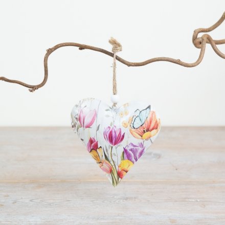 Vibrant floral heart-shaped hanging ornament with colorful blooms.