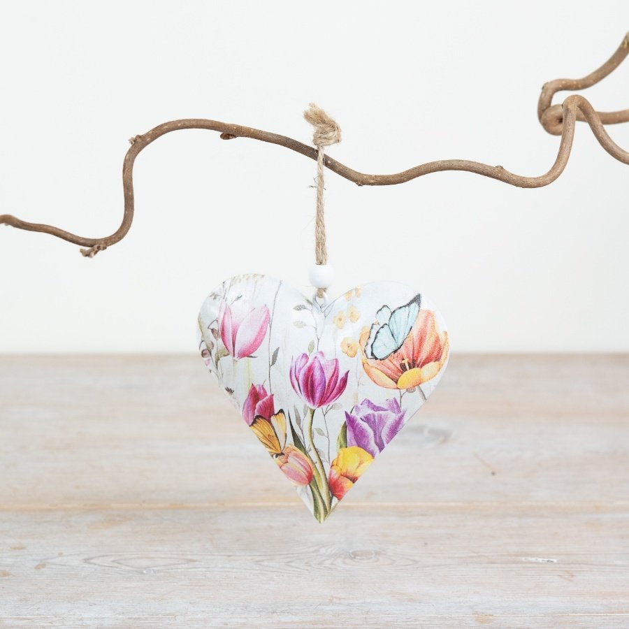 Vibrant floral heart ornament for hanging decoration.