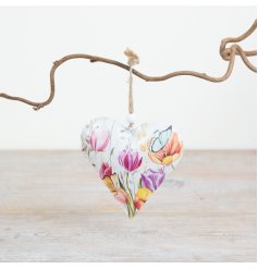 Vibrant floral heart-shaped hanging ornament with colorful blooms.