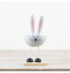 Enhance your spring and Easter decor with this adorable white porcelain rabbit face accent.