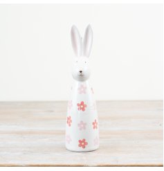 Tall ceramic bunny decor featuring a charming daisy pattern.
