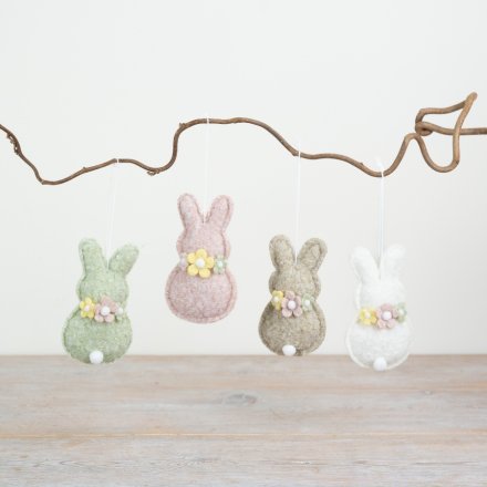 Bring a playful charm to your spring and Easter decorations with this delightful piece.