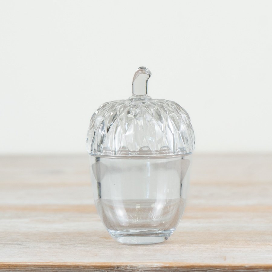 Glass acorn pot with detailed cut-out lid, perfect for storing nuts or sweet treats!