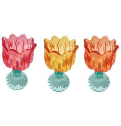  Add vibrant colour to your space with these elegant flower candlesticks.