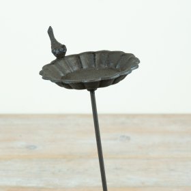 Draw birds in with this charming cast iron rustic bird feeder.