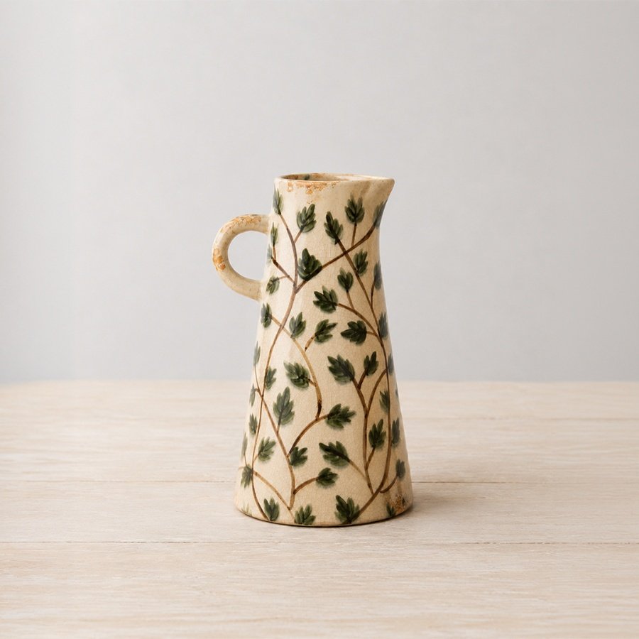 Transform your space with our stunning Leaf Ceramic Jug Vase, 