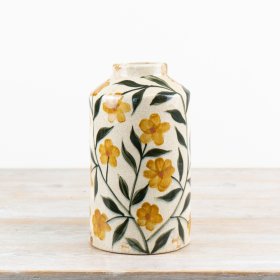 Add elegance to your space with this glazed vase, perfect for displaying  blooms. 