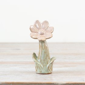 Elevate your decor with a darling floral accent in soft pink hues and a lush green stem. Perfect for any space!