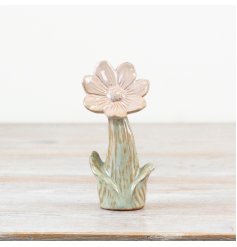Elegant standing flower decoration in ditsy pink tone with warm green stem. Perfect for any room, adds a touch of char