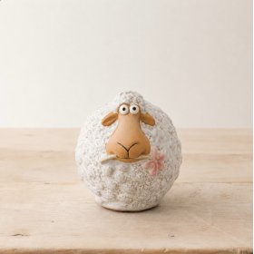 Adorable sheep with a pretty pink flower in its mouth. Made of soft wool. Perfect for animal lovers. 