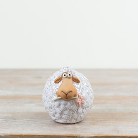 Wooly sheep with pink flower in mouth - a charming addition to any home decor