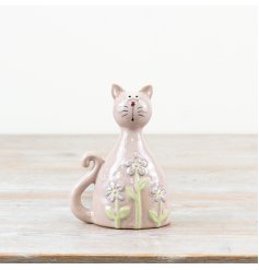 Pastel pink cat with daisy designs, coated in a glossy clear glaze finish.