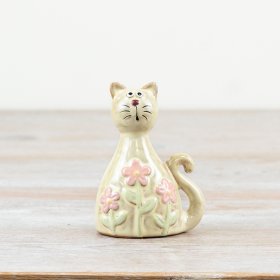 Glossy pastel pink cat adorned with daisy patterns and finished with a clear glaze.