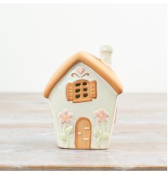 Charming fairy house spring tealight holder, perfect for brightening your space with a magical touch.