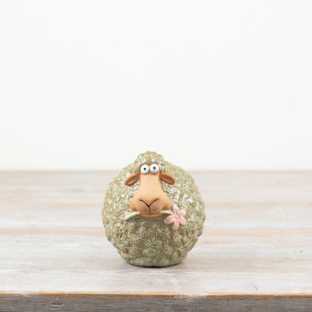 Bring charm to your decor with this delightful Green Sheep Flower Ornament.