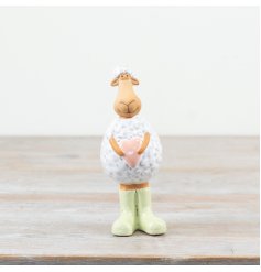 Enhance your spring décor with this adorable porcelain Standing Sheep for a charming touch.