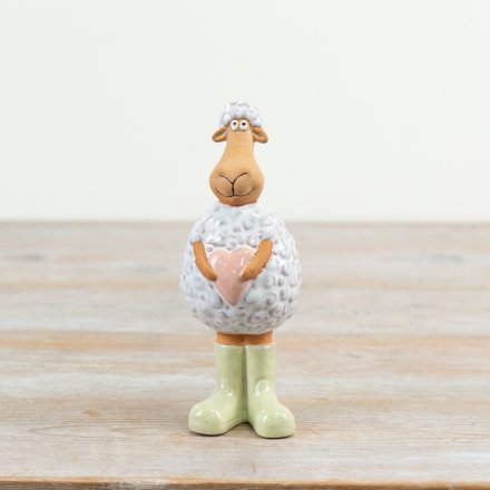 Add a charming touch to your spring décor with this delightful porcelain Standing Sheep,