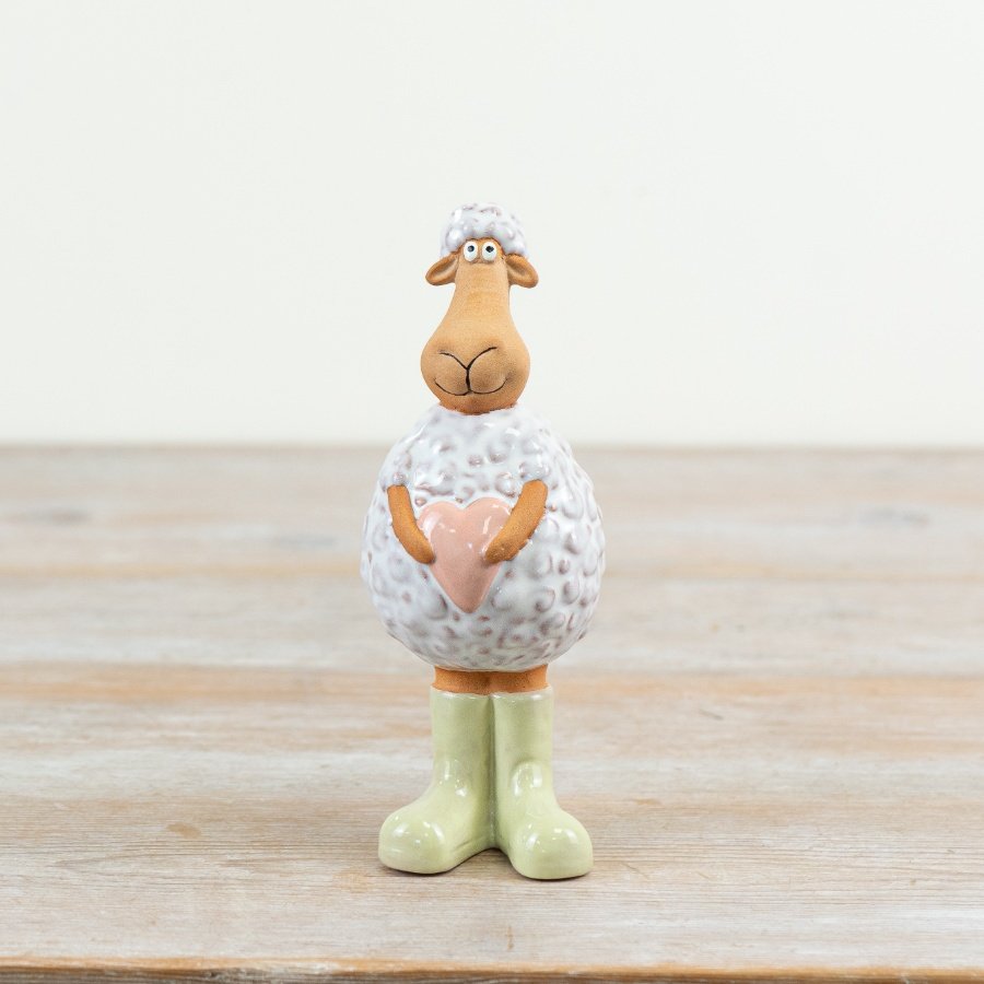 Add spring charm to your Easter décor with this delightful 15.2 cm porcelain Standing Sheep, dressed in pastel pink and