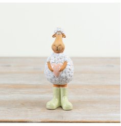 Enhance your spring décor with this adorable porcelain Standing Sheep for a charming touch.