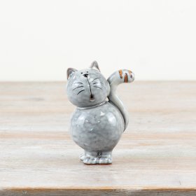 Glossy cat ornament in a natural grey shade with a sleek finish.