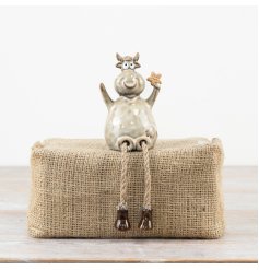 Glossy highland cow decorative ornament with a smooth finish.