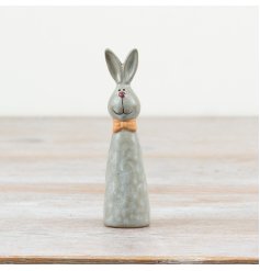Standing rabbit ornament featuring a decorative bow.