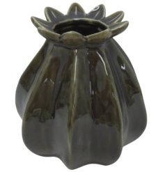 Embrace farmhouse-inspired beauty with this ceramic vase