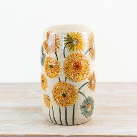 The Dandelion Ceramic Vase showcases a glossy orange glaze with a delicate dandelion pattern.