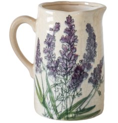 Bring elegance to any space with this charming lavender ceramic vase jug.