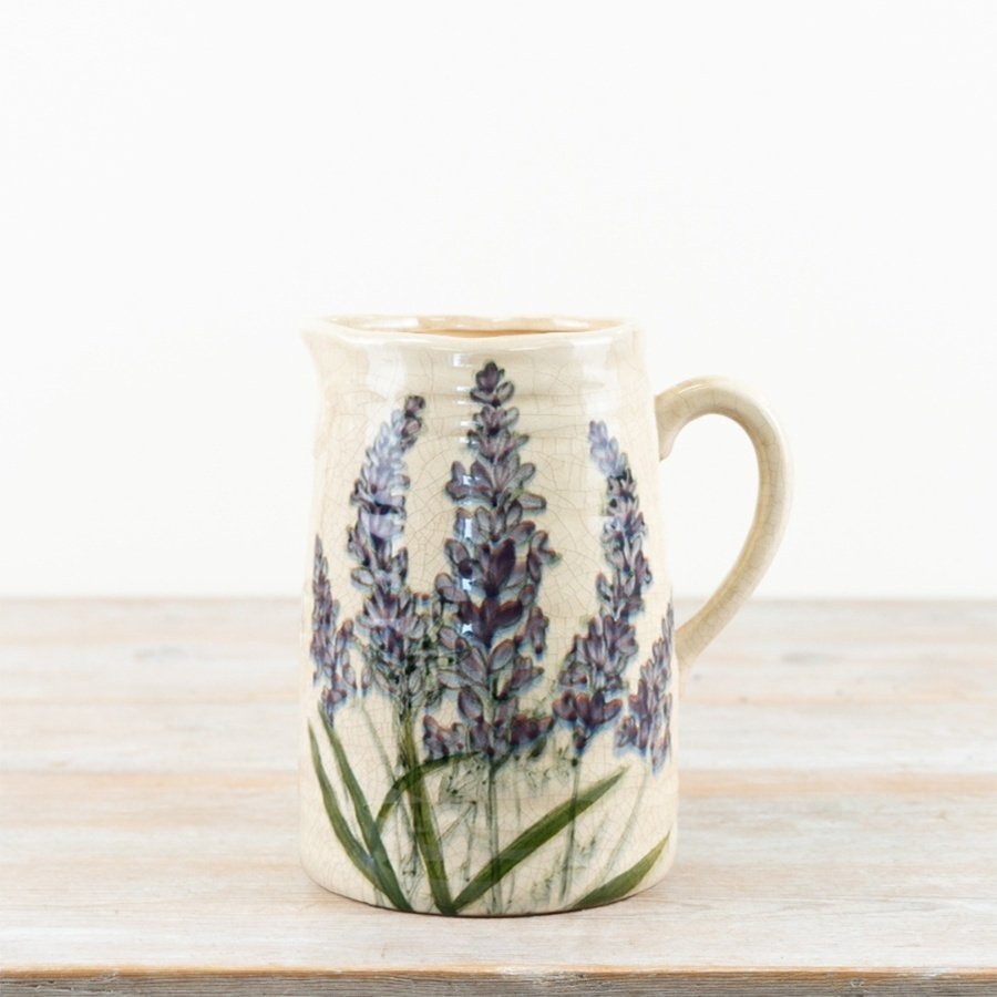 Bring elegance to your space with this stylish Lavender Ceramic Vase Jug.