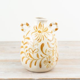 Charming vase featuring a floral pattern and two elegant handles.