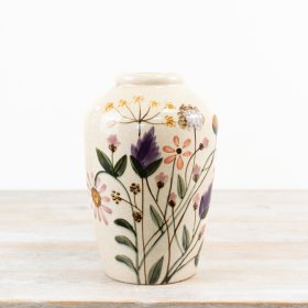 Lovely vase featuring a delightful floral pattern.