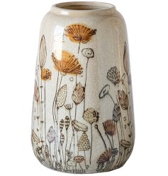 Elevate your space with this elegant ceramic vase in white and orange hues.
