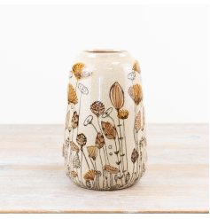 Elevate your space with this elegant ceramic vase in white and orange hues.